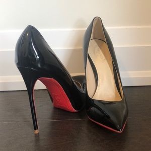 Black patent red rubber sole heels size 7.5